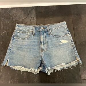 Madewell light blue denim shorts. Side 26